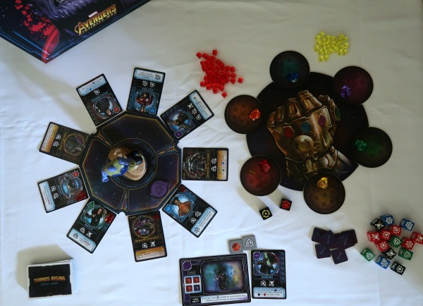 Overhead view of the Thanos Rising board game set up.