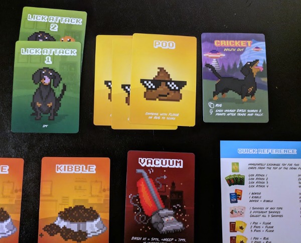 Cricket Doxie Hero card plus other cards from the Doxie Dash card game.