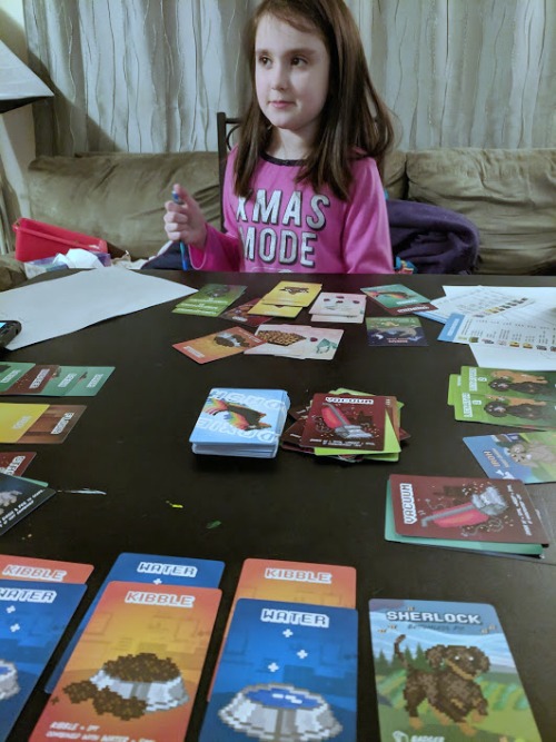 My daughter playing Doxie Dash during family game night.